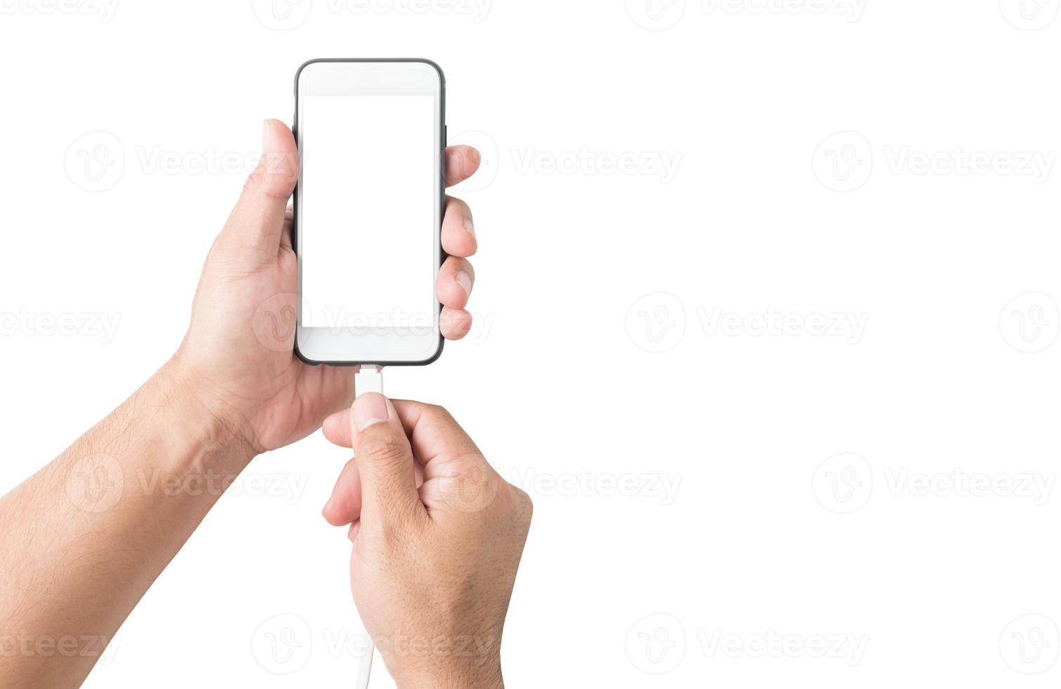 main mettre câble charge à mobile téléphone photo