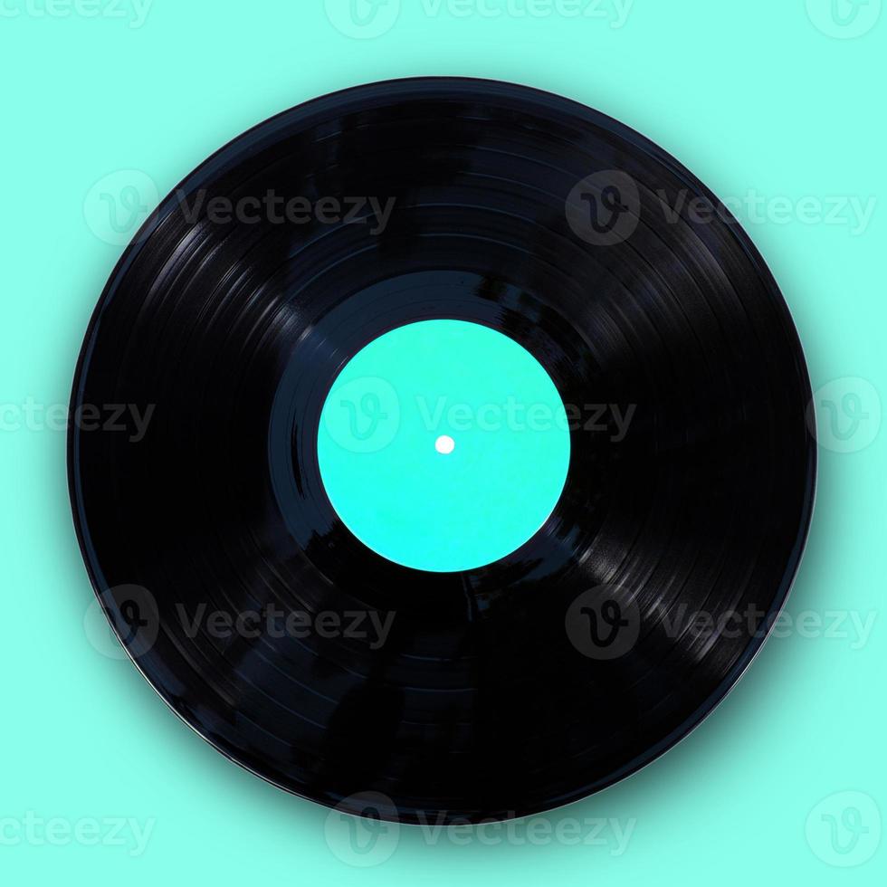 disque vinyle sur fond vert-bleu photo