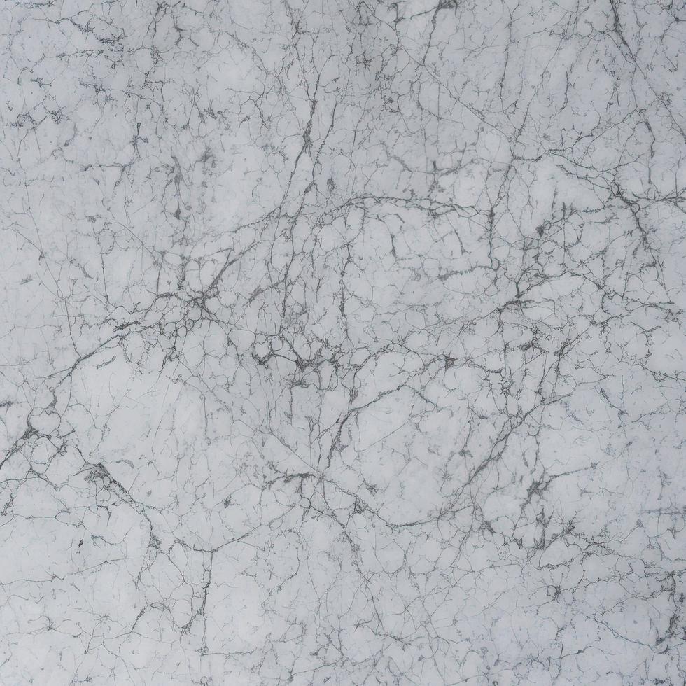 texture de pierre de marbre blanc pour le fond ou le design décoratif de carreaux de sol et de papier peint luxueux. photo