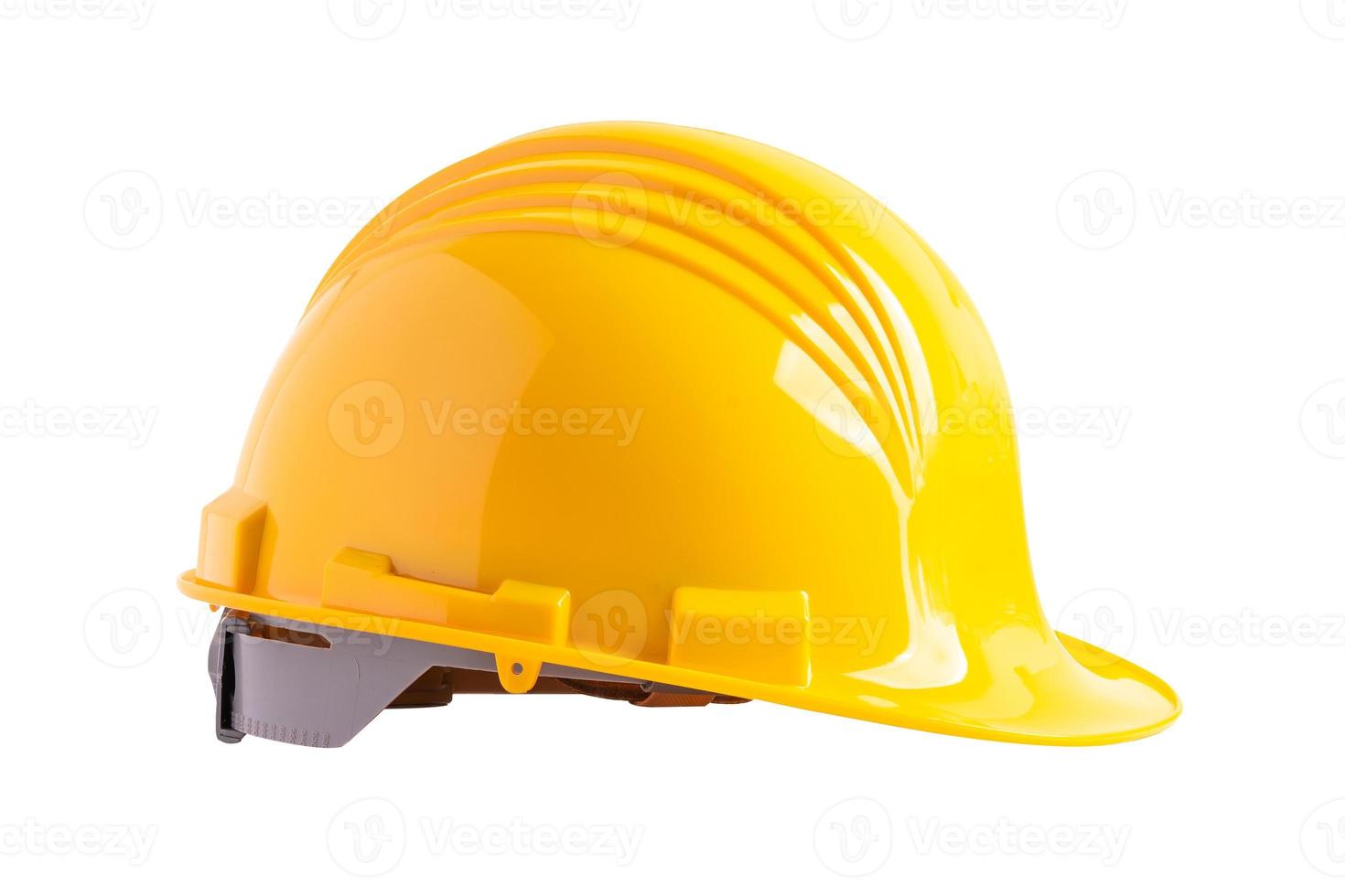 casque de construction jaune isolé sur fond blanc avec un tracé de détourage, concept de sécurité de l'ingénieur. photo