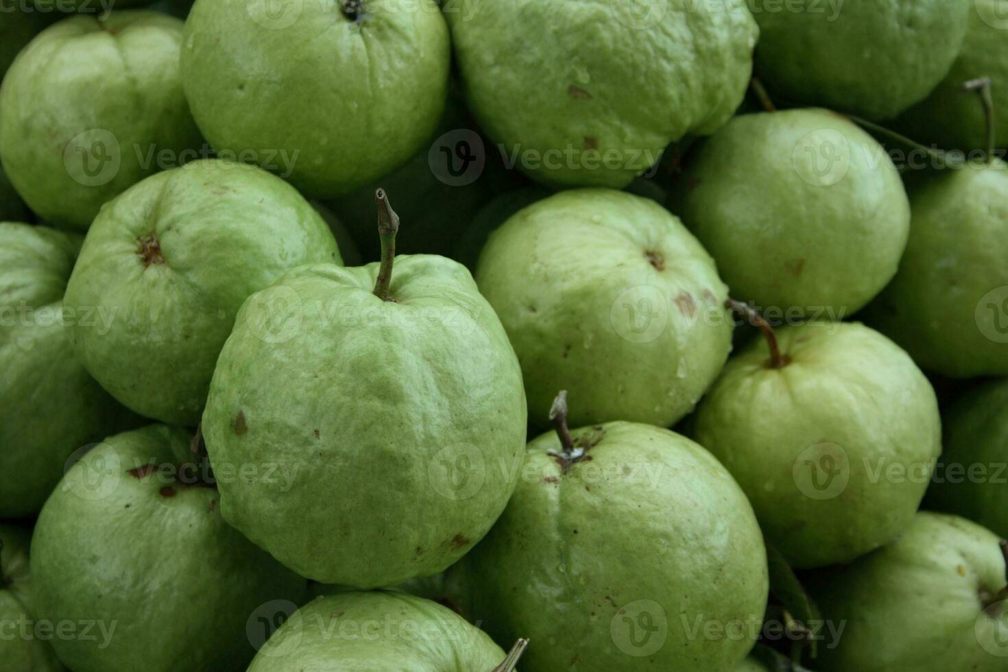 empiler de Pomme goyaves sur une marché stalle photo