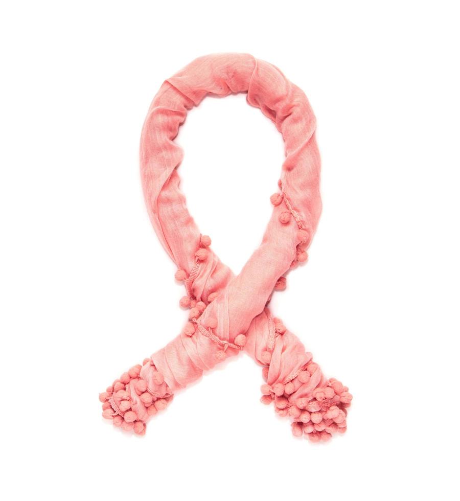 Ruban rose du sida de tissu délicat torsadé isolé sur fond blanc photo