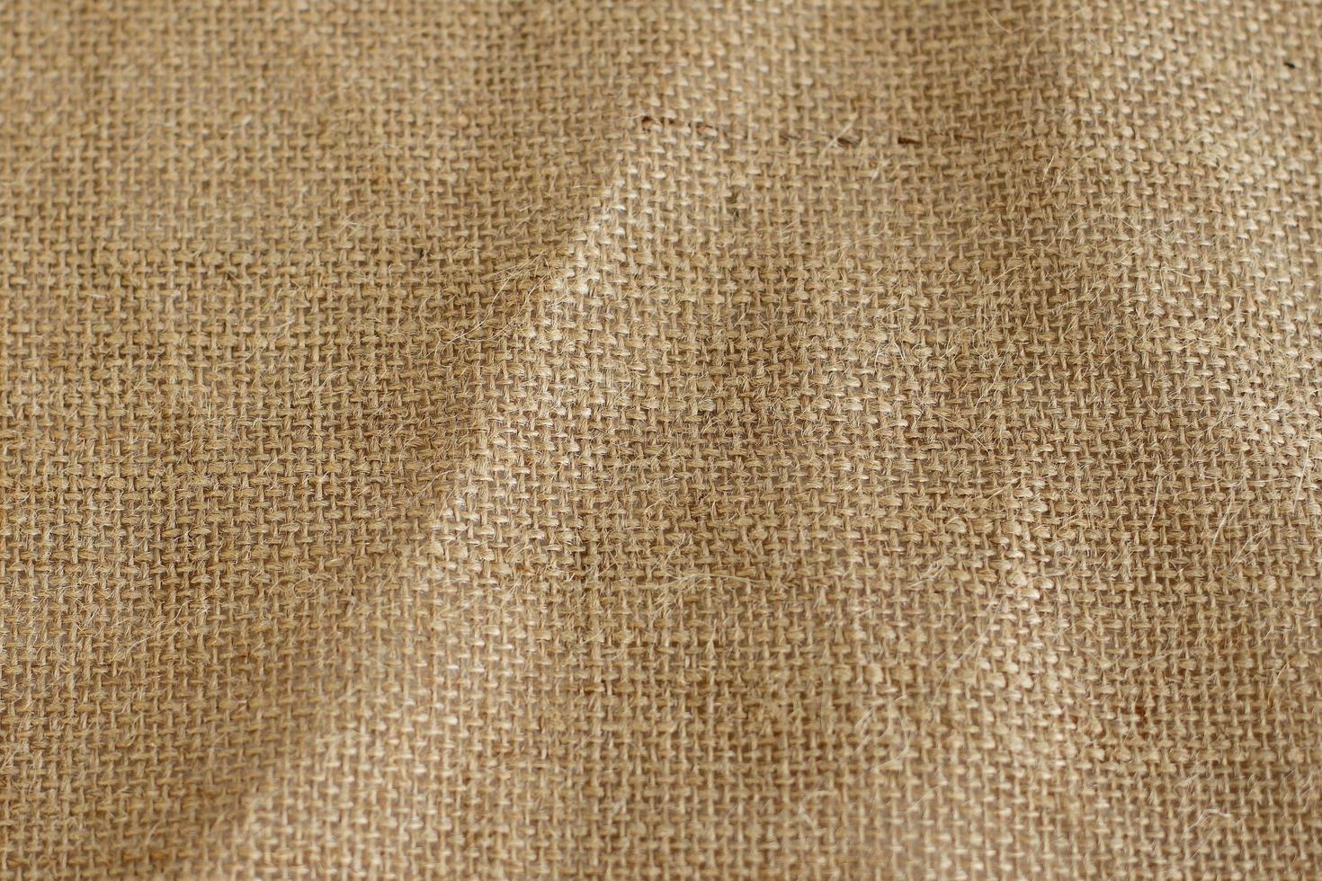 sac en fibre de jute fond texturé marron photo