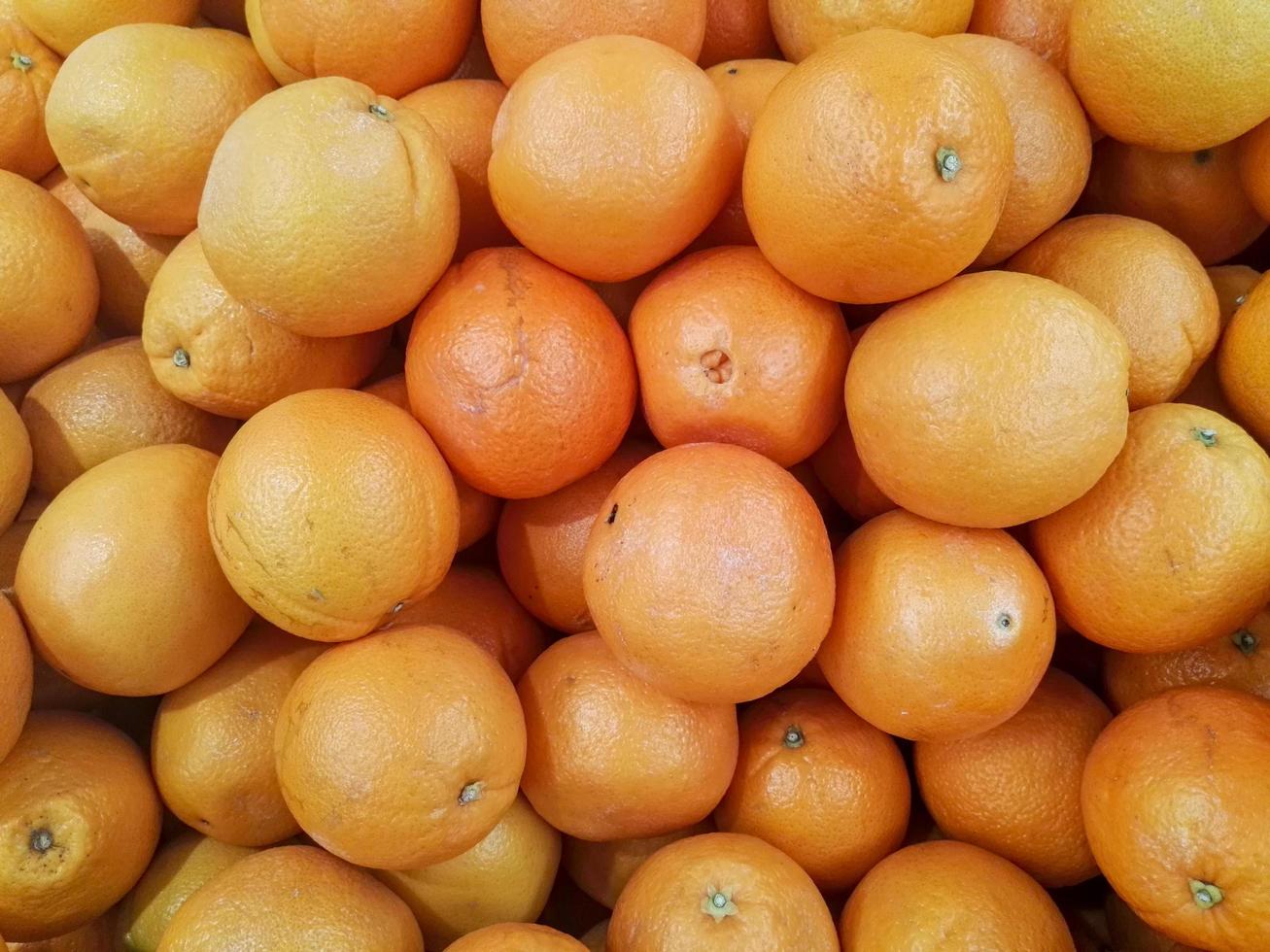 groupe d'oranges fruits ou mandarine photo
