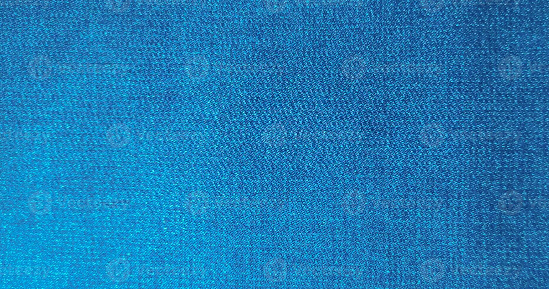 lumière bleu Couleur abstrait denim veste, ancien denim jeans tissu et en tissu proche en haut macro photo pour Contexte