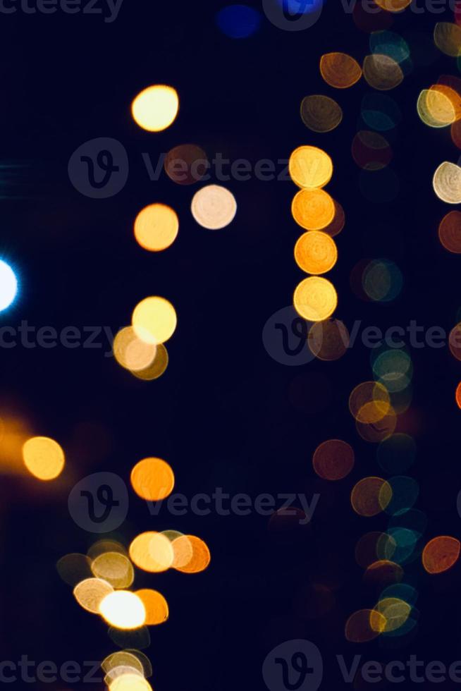 lumières de bokeh multicolores la nuit photo