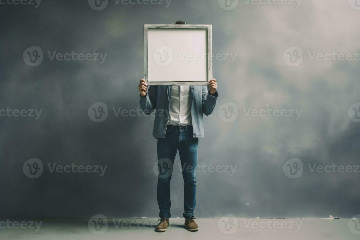 plein corps portrait de homme tenir Vide image Cadre sur gris Couleur Contexte. génératif ai photo