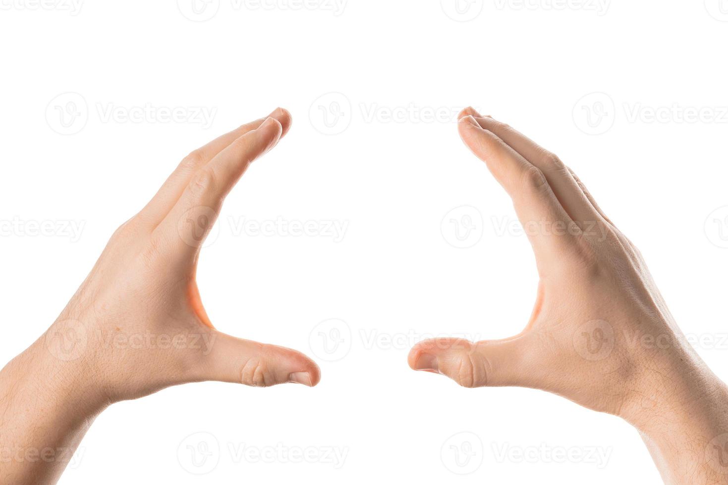 homme main tenir, saisir ou attraper un objet, geste de la main. isolé sur fond blanc. photo