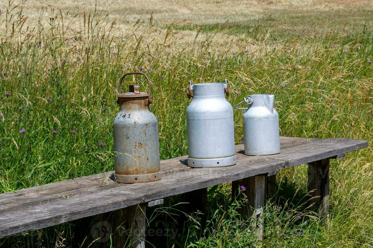 Lait cruche sur le ferme photo