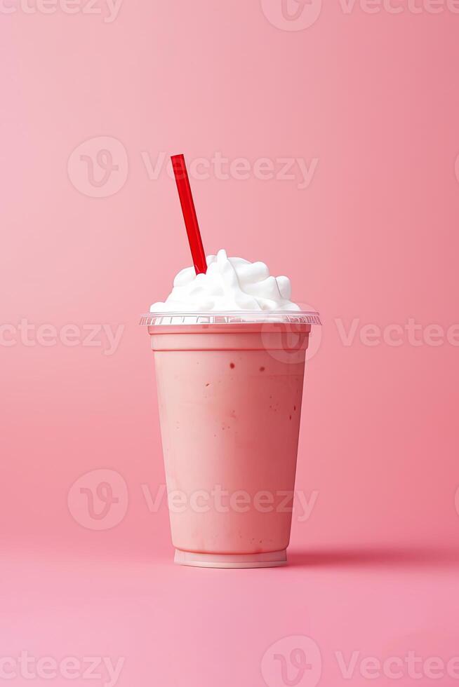 fraise Milk-shake dans Plastique à emporter tasse isolé sur rose Contexte. ai généré photo