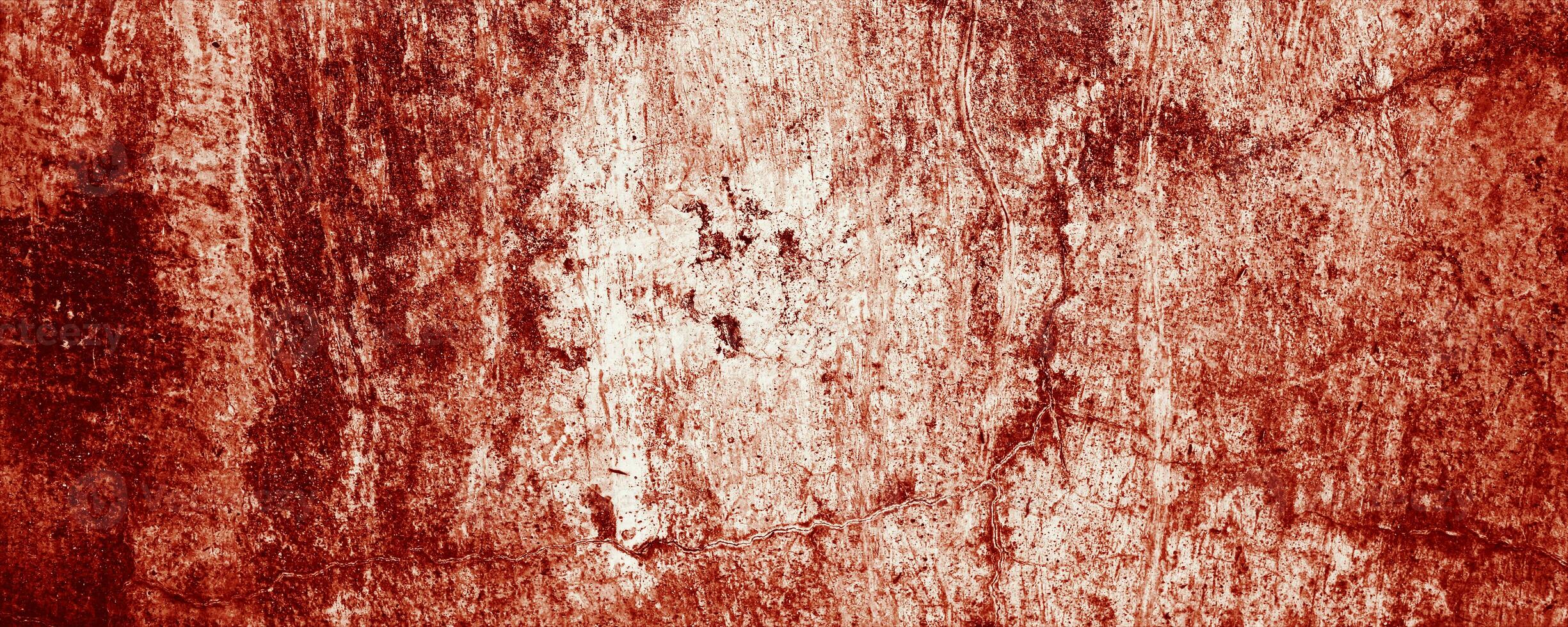 panoramique rouge mur grunge texture. abstrait effrayant béton, horreur ciment pour Contexte. photo