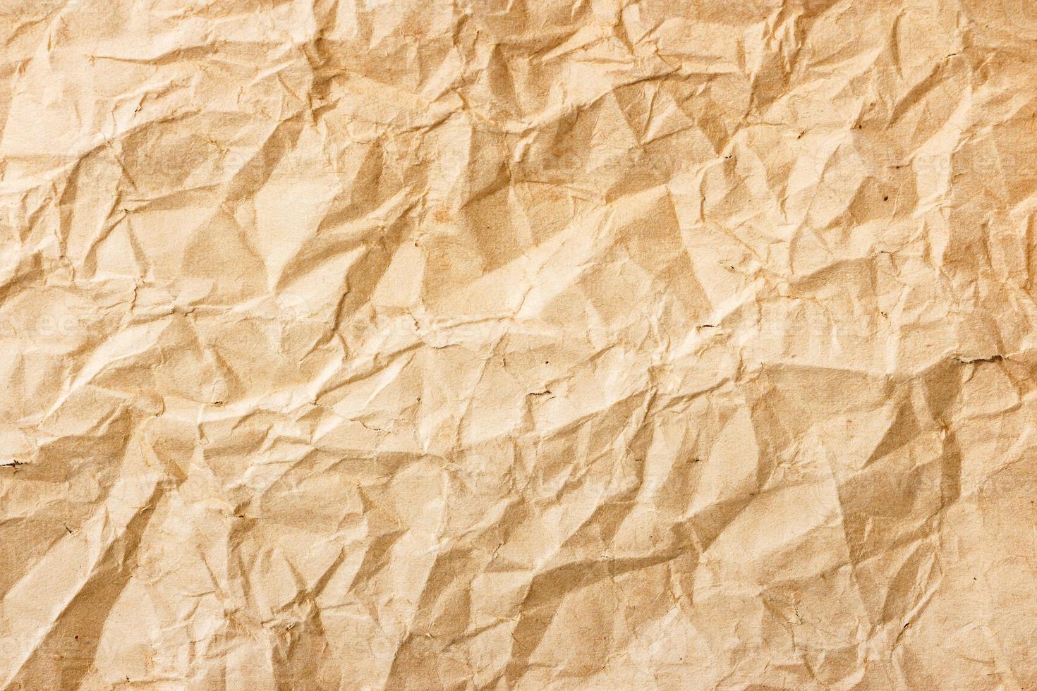 la texture du vieux papier froissé marron photo