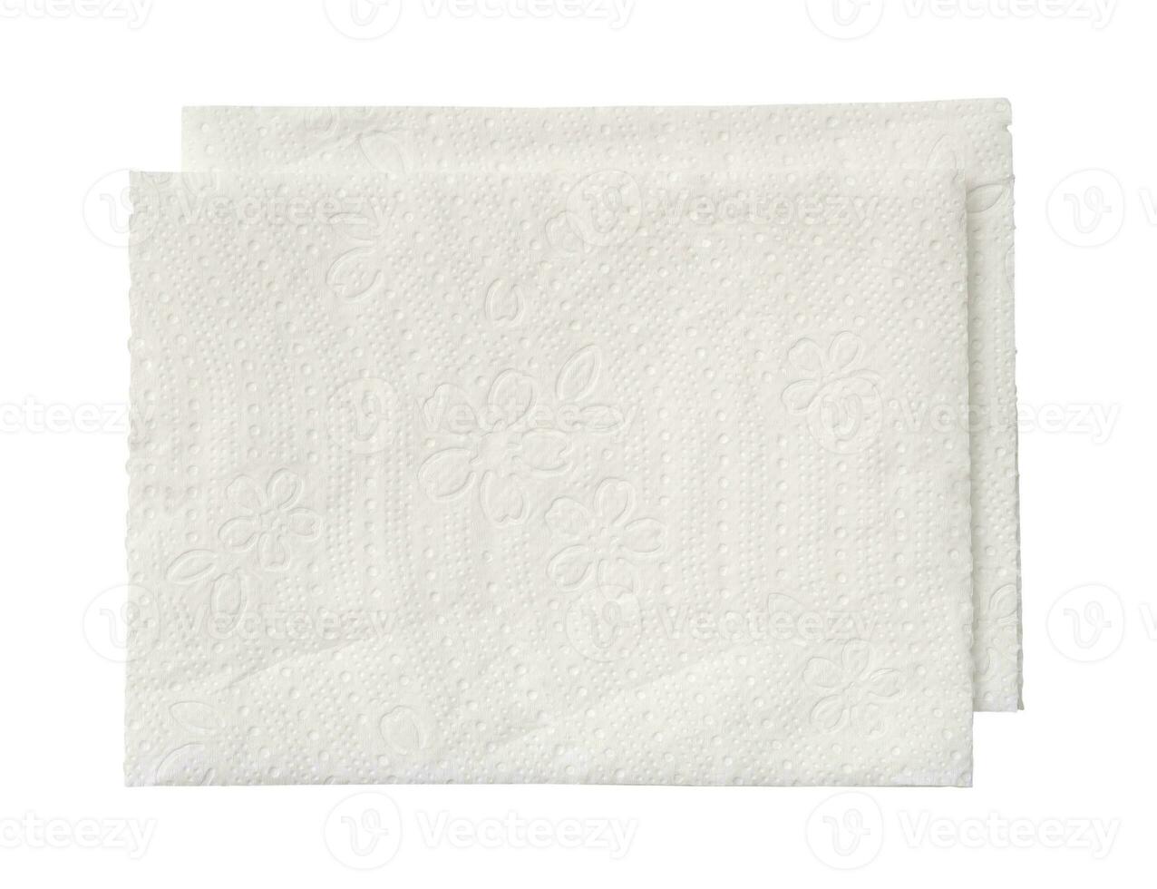 Haut vue de deux plié pièces de blanc tissu papier ou serviette de table dans empiler isolé sur blanc Contexte avec coupure chemin. photo
