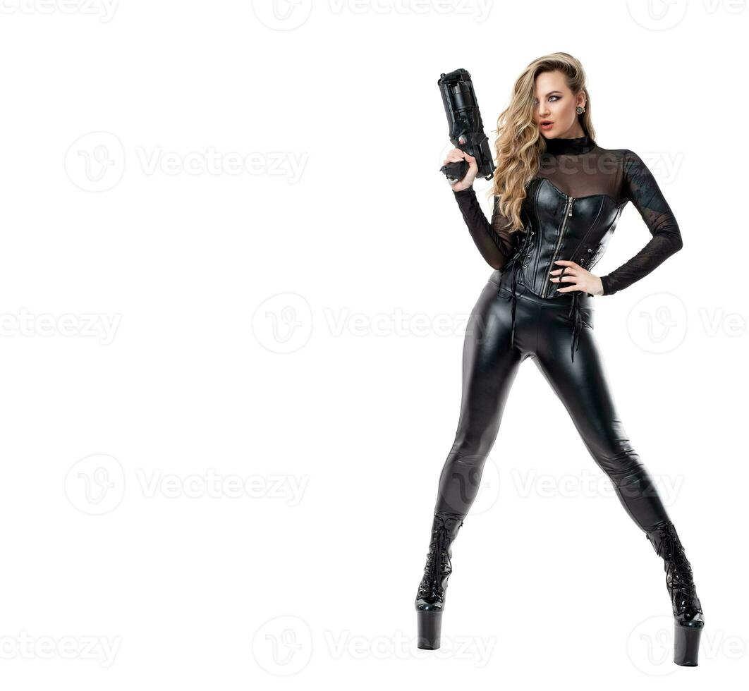 beau sexy femme dans le maillot de corps et corset avec pistolet photo