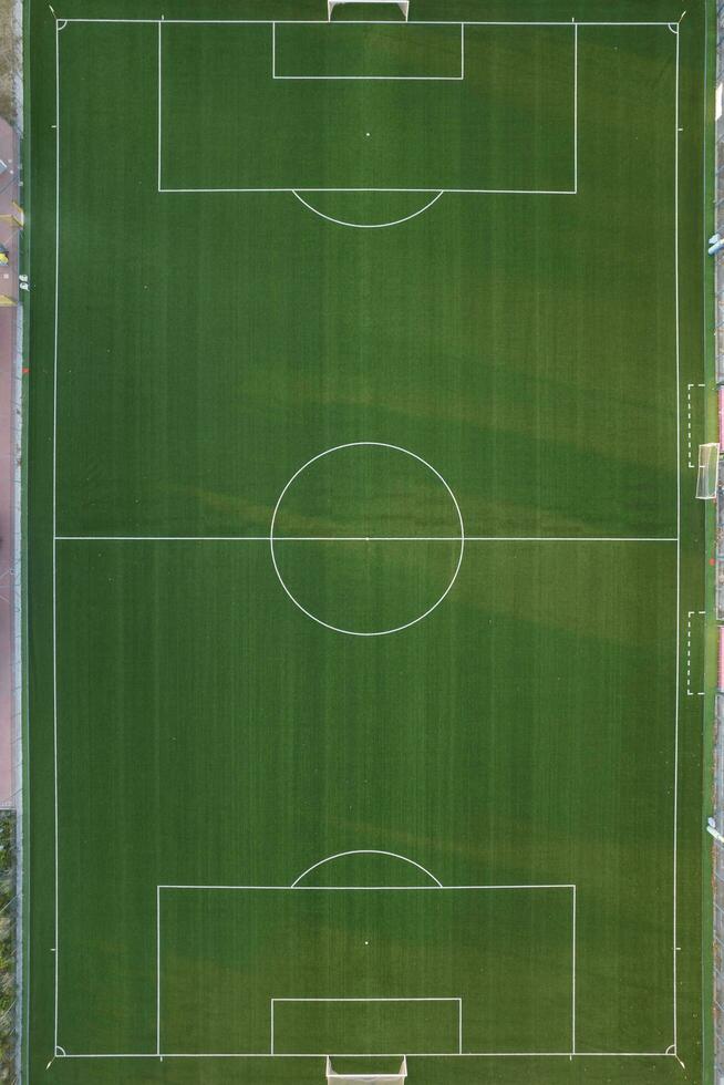aérien vue de une vert champ pour en jouant Football photo