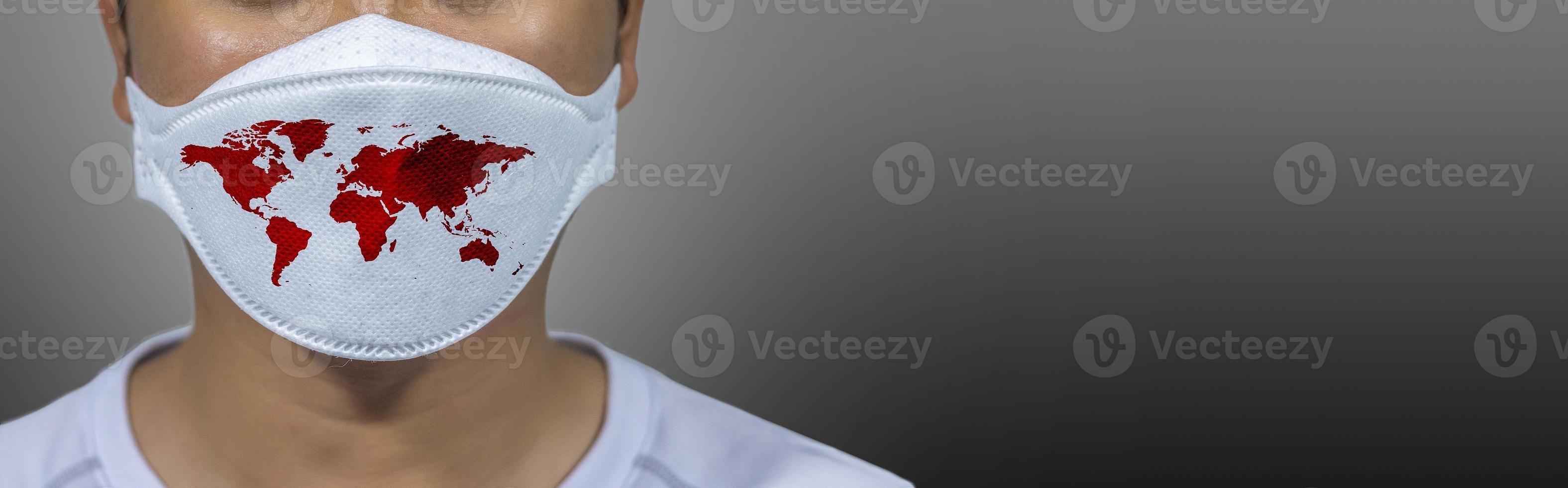 protection contre les virus covid 19 le monde porte un masque pour lutter contre le virus corona. le concept de lutte contre les virus dans le monde photo