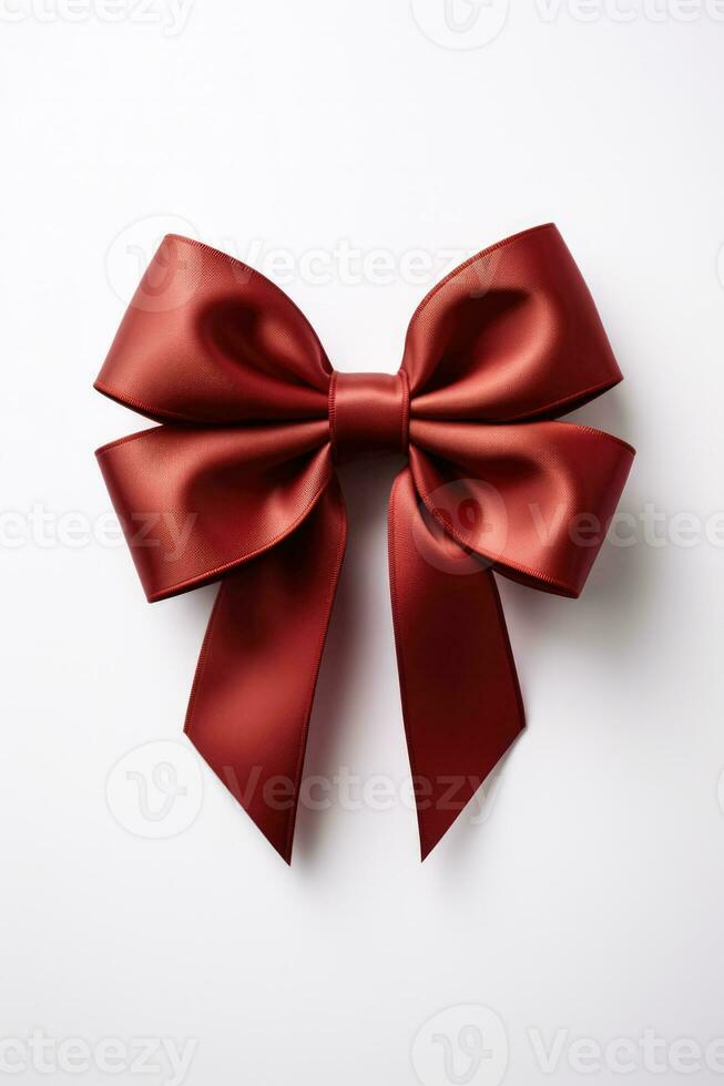 rouge cadeau arc sur blanc simple et élégant vacances décoration photo