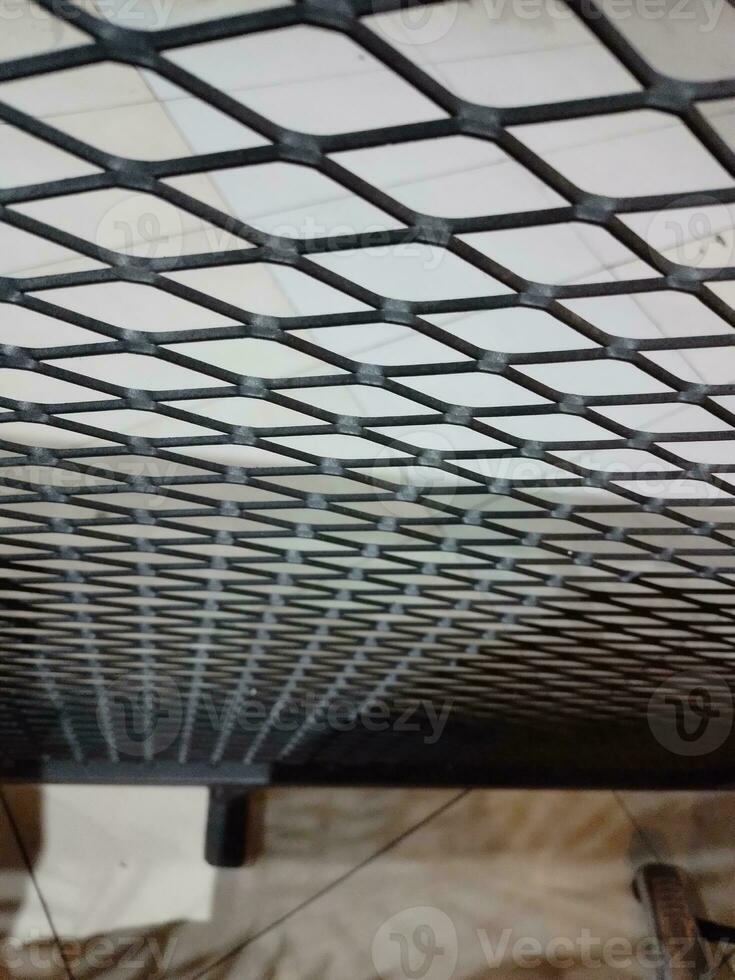 le conception de le le fer clôture avec le rhombe motif dans noir photo