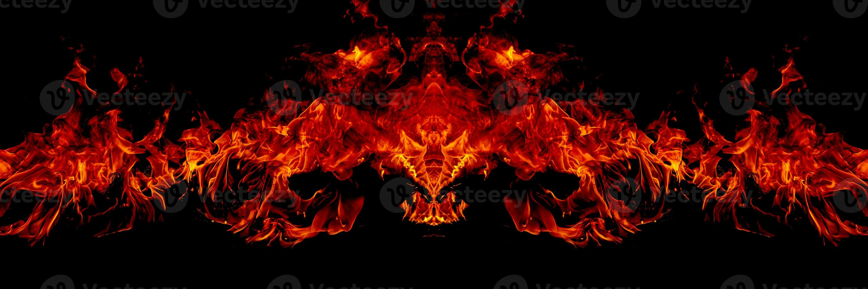 des flammes de feu sur fond noir d'art abstrait, des étincelles rouges brûlantes s'élèvent, des particules volantes rougeoyantes orange ardente photo