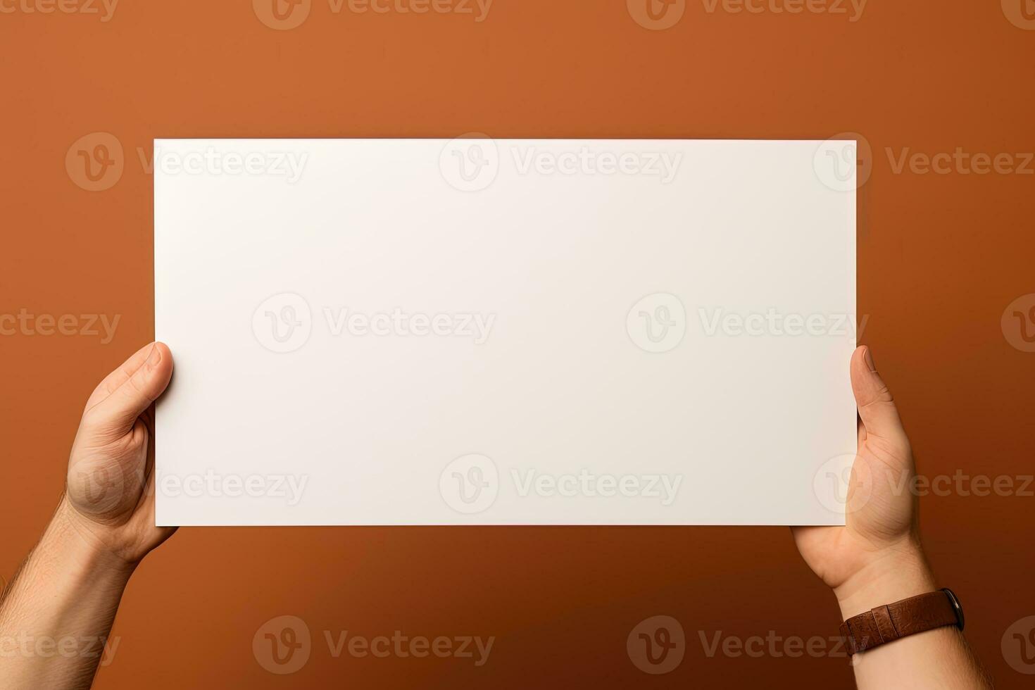 une Humain main en portant une Vide feuille de blanc papier ou carte isolé sur marron Contexte. ai généré photo