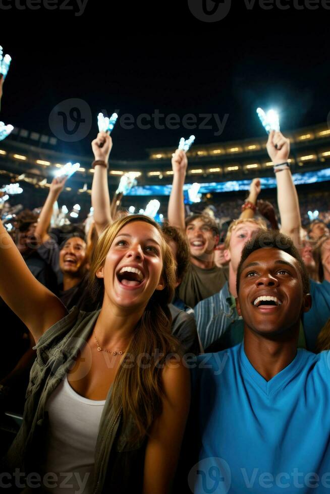 une groupe de enthousiaste Football Ventilateurs recueillir en dessous de stade lumières prêt à acclamation sur leur préféré équipe pour le ouverture Jeu de le saison photo