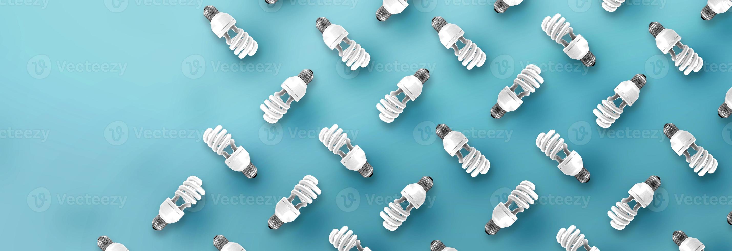 modèle d'ampoule fluorescente sur fond bleu. photo