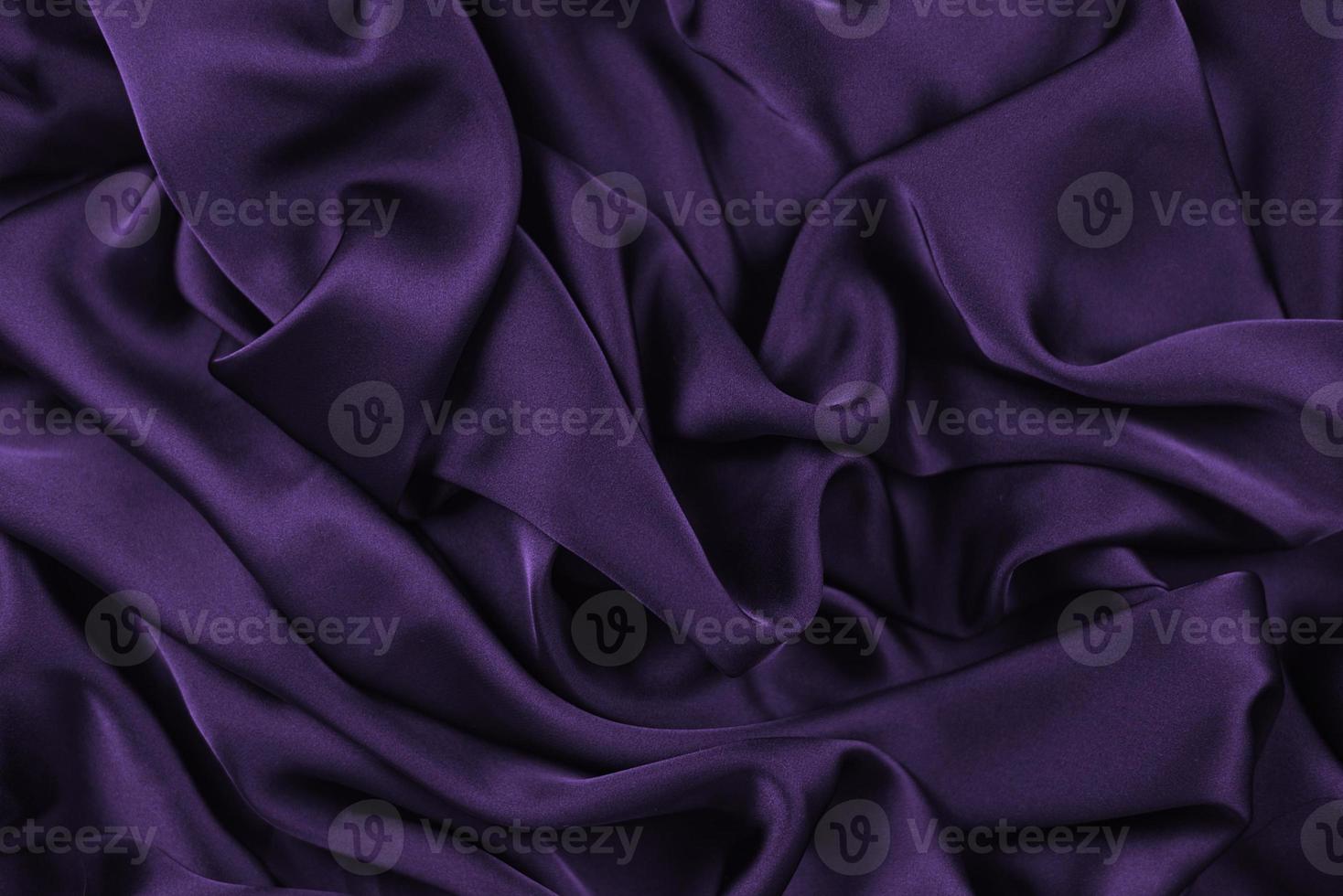la texture du tissu de luxe en soie ou en satin peut être utilisée comme arrière-plan abstrait. vue de dessus. photo