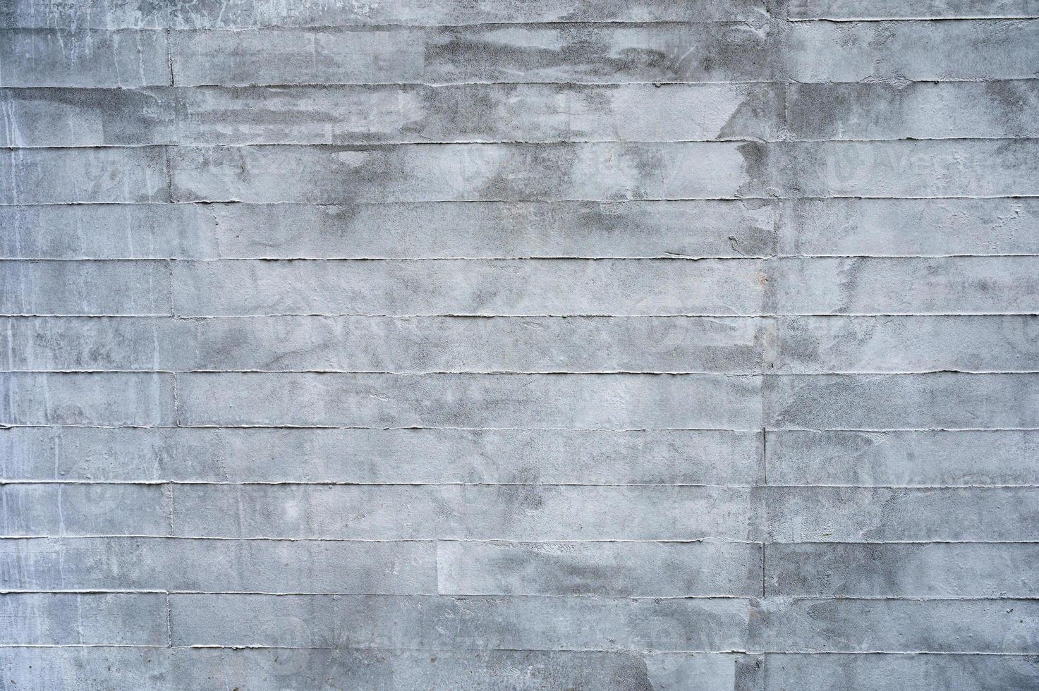 texture du mur de blocs de briques de ciment teinté gris photo