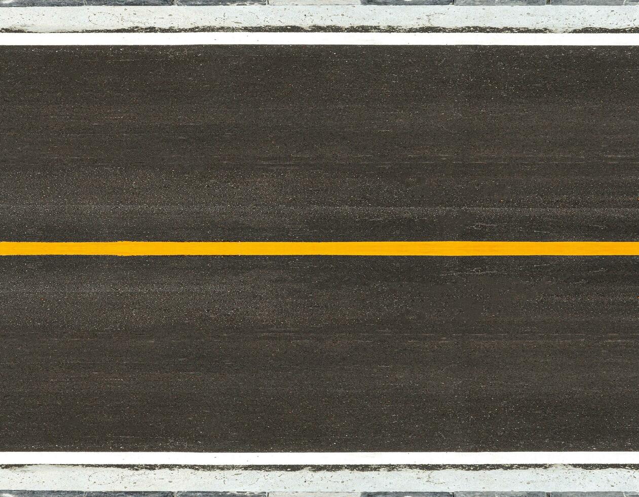 asphalte route avec marquage lignes Jaune rayures circulation sur le route surface texture Contexte. photo