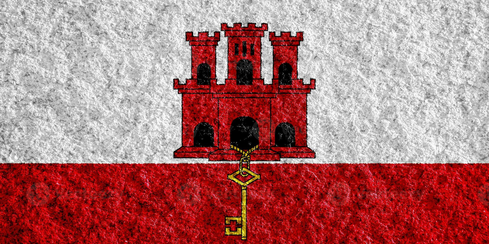drapeau de gibraltar sur un fond texturé. collage conceptuel. photo