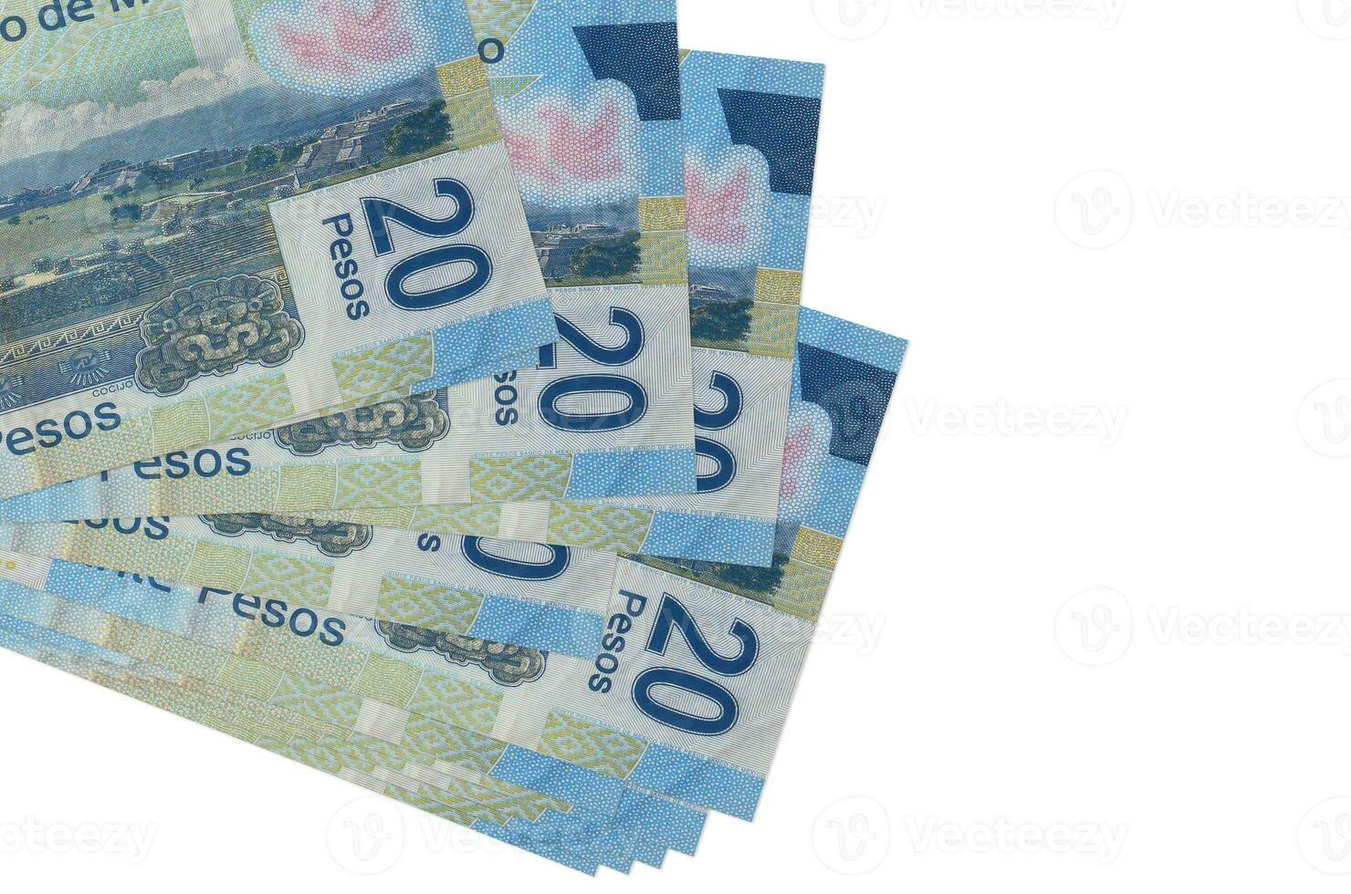 20 billets de pesos mexicains se trouvent dans un petit groupe ou un paquet isolé sur blanc. maquette avec espace de copie. commerce et change photo