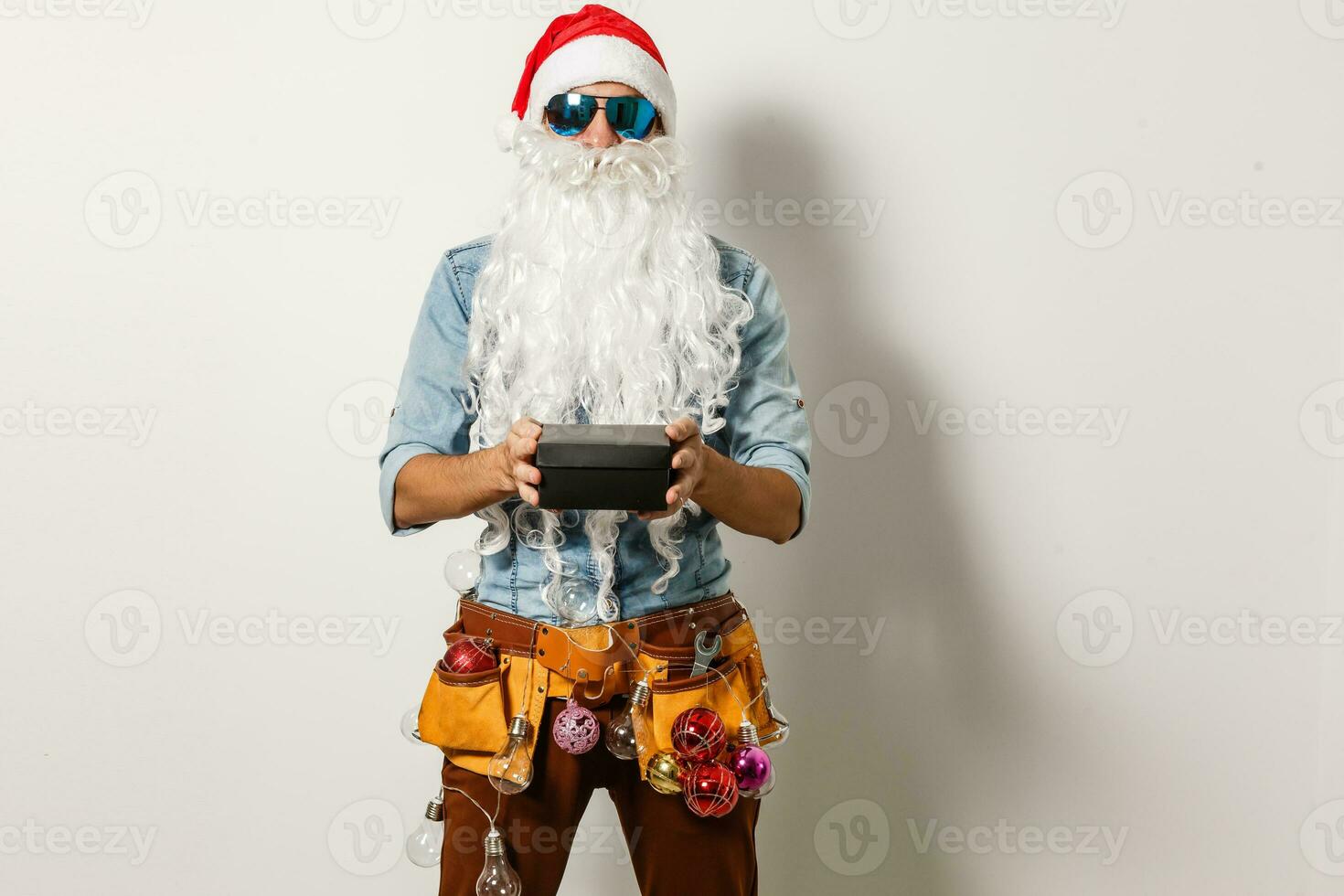 Père Noël claus portant des lunettes de soleil. cool Père Noël photo