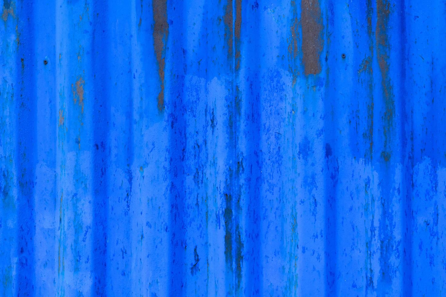 texture de mur en métal qui s'écaille bleu photo