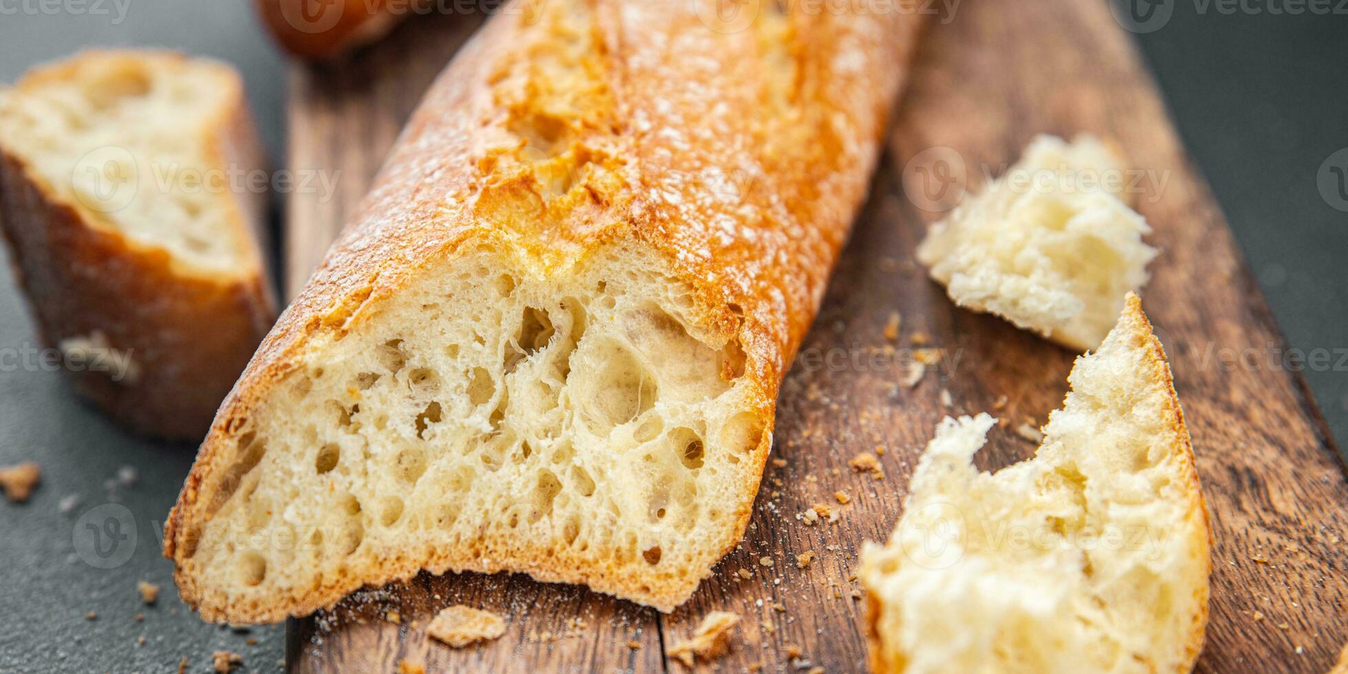 Frais baguette délicieux pain longue chignon apéritif repas nourriture casse-croûte sur le table copie espace photo