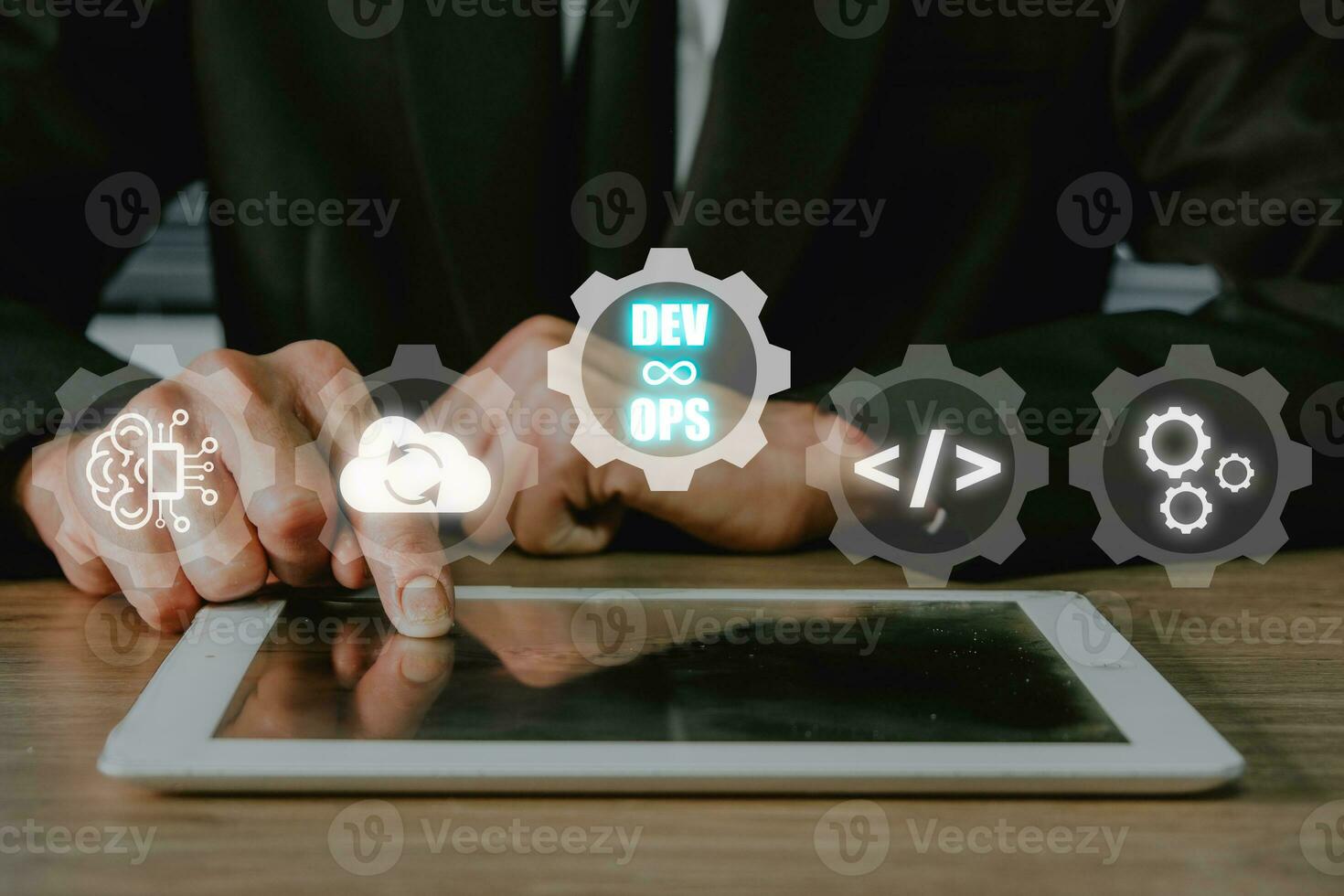devops concept, homme main émouvant tablette avec devops icône sur vr écran sur bureau, méthodologie développement opérations agile programmation technologie.concept. photo