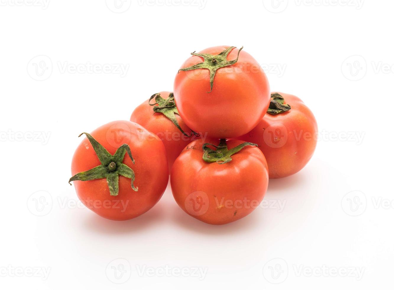 tomates fraîches sur fond blanc photo