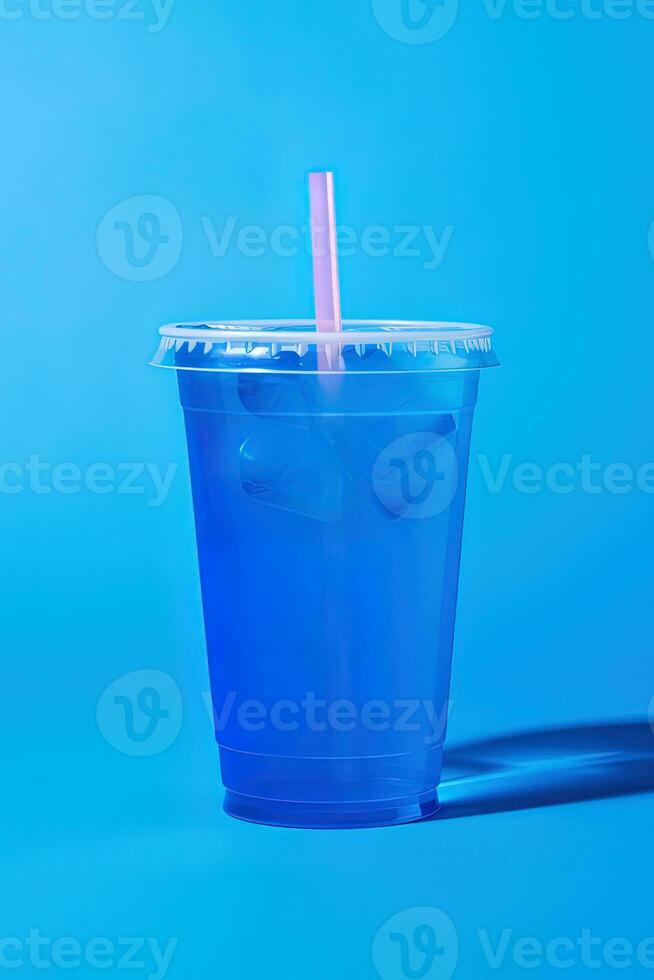 bleu boisson dans une Plastique tasse isolé sur une bleu Contexte. prendre une façon les boissons concept. ai généré photo