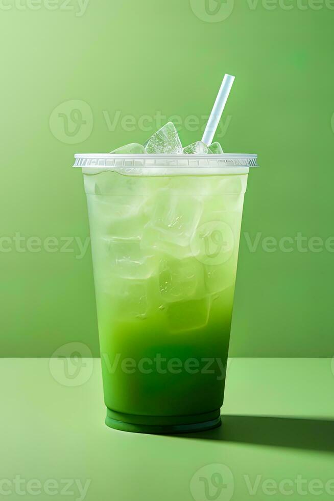 vert boisson dans une Plastique tasse isolé sur une vert Contexte. prendre une façon les boissons concept. ai généré photo