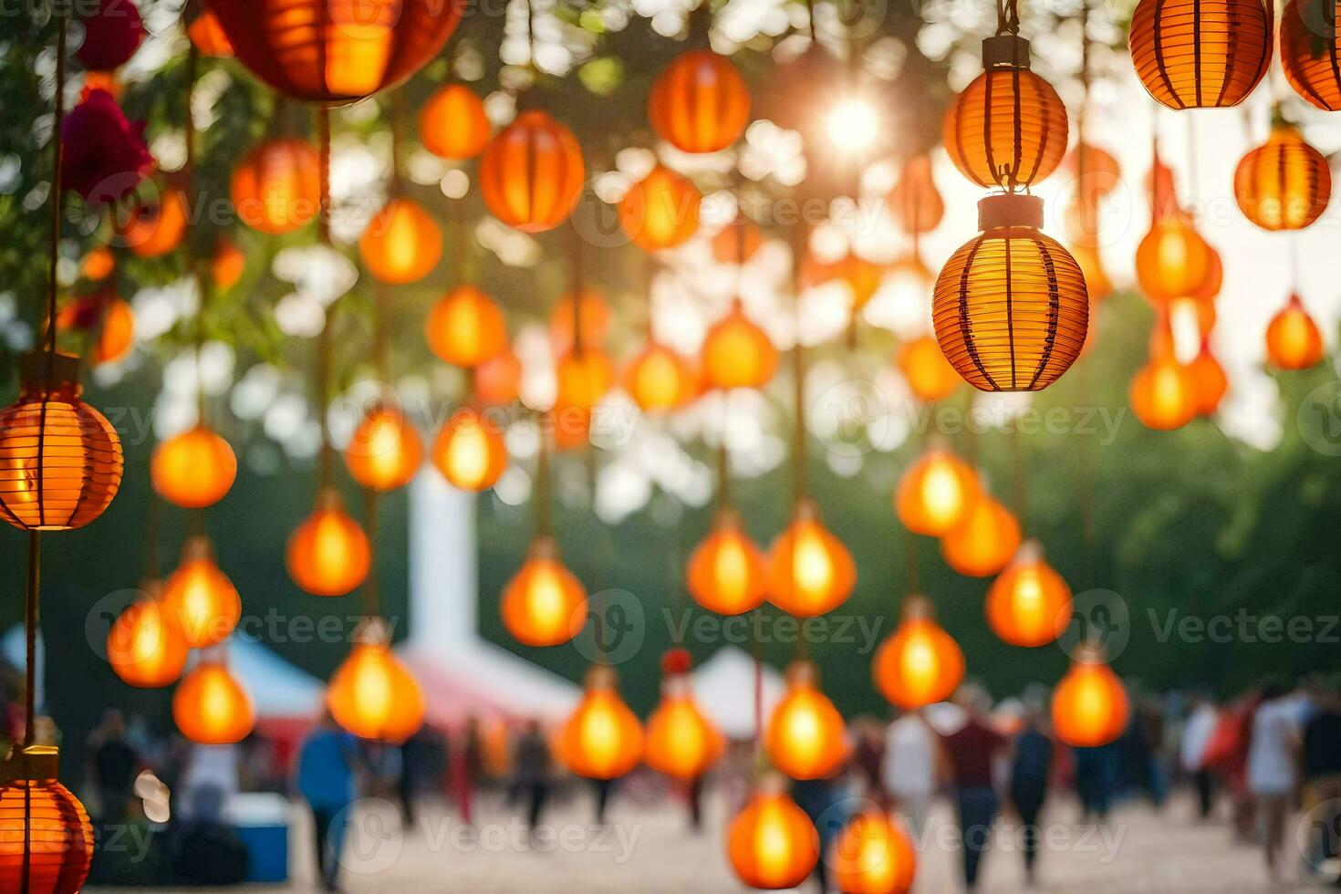 Orange papier lanternes pendaison de des arbres dans une parc. généré par ai photo