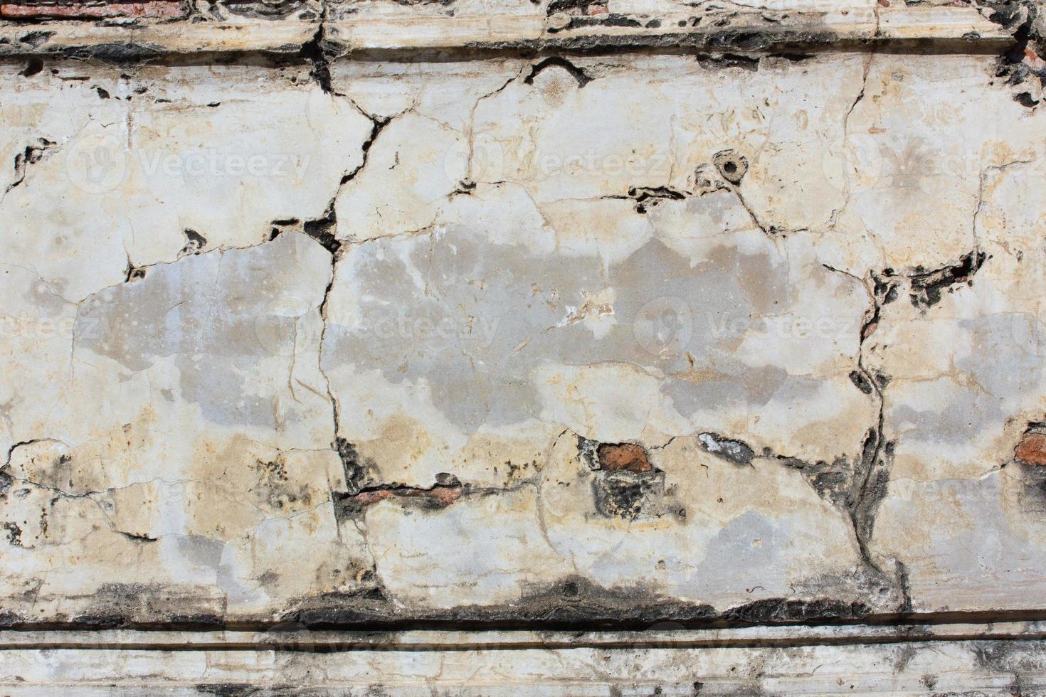 Mur de ciment en béton grunge avec fissure photo