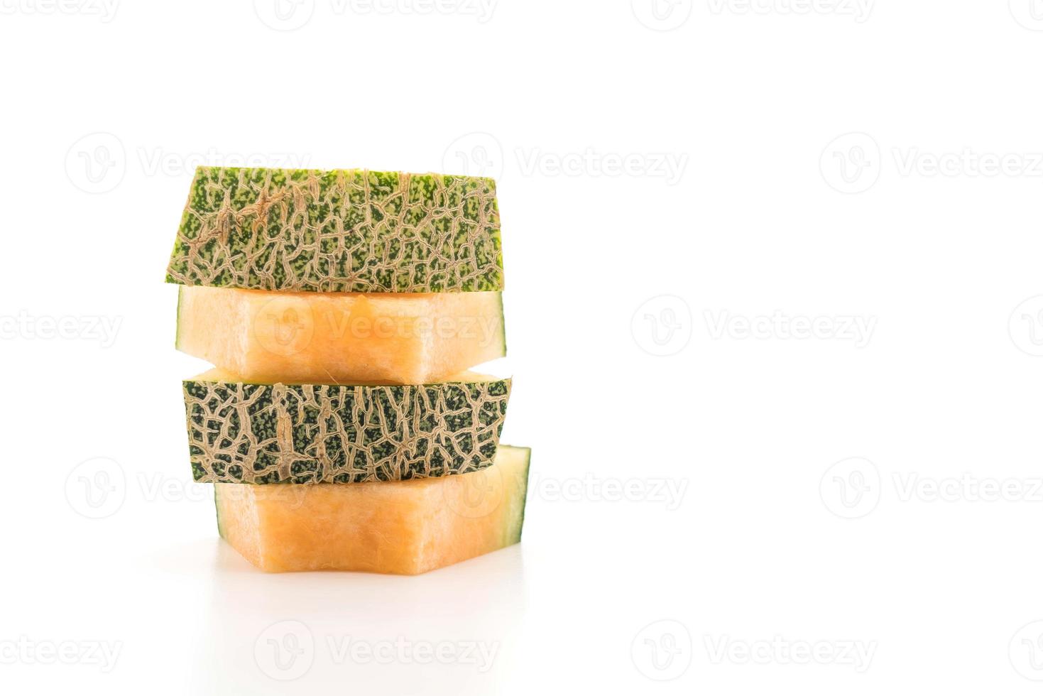 Melon cantaloup sur fond blanc photo