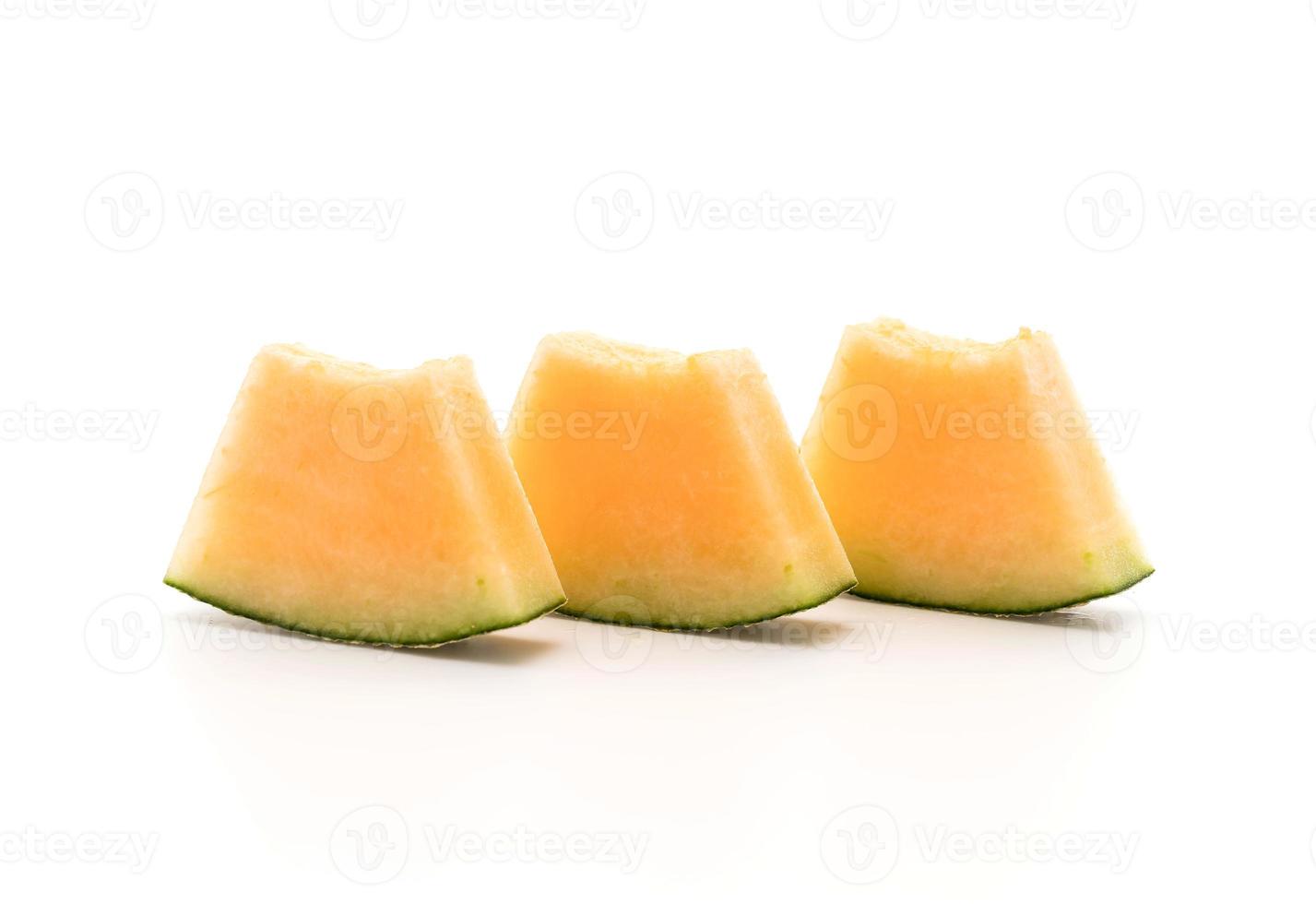 Melon cantaloup sur fond blanc photo