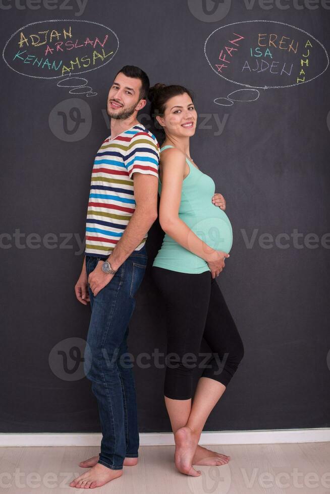 couple enceinte écrit sur un tableau noir photo