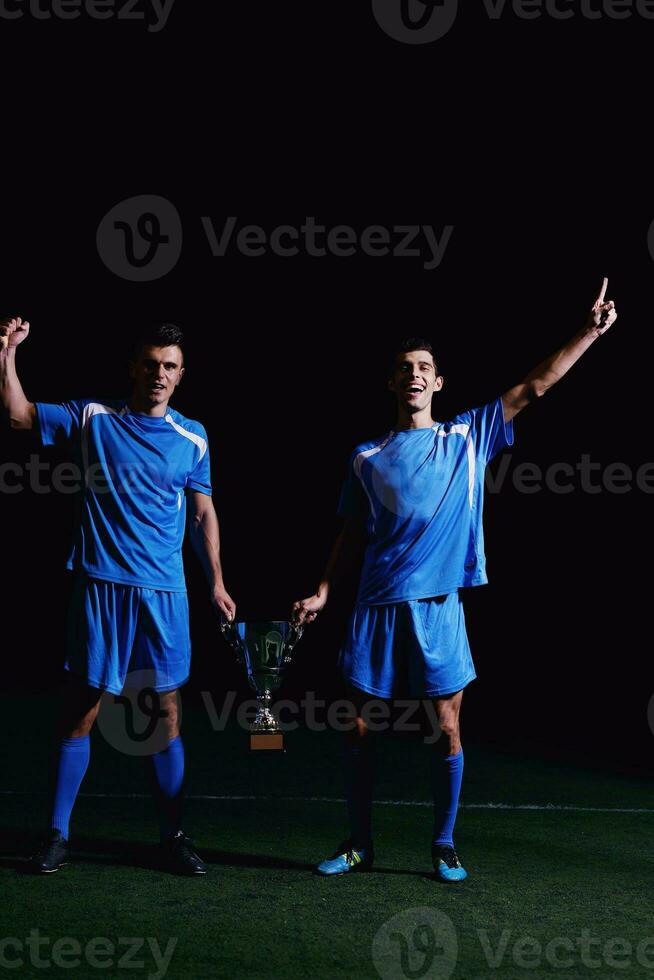 joueurs de football célébrant la victoire photo