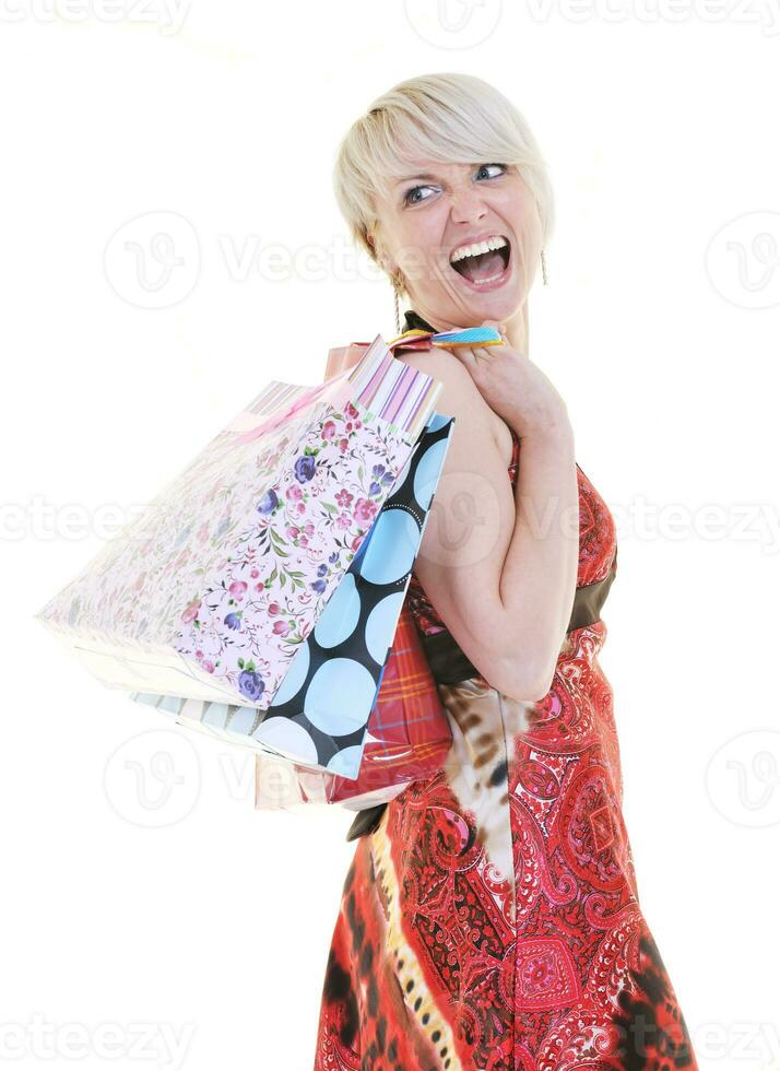 Happy young adult women shopping avec des sacs colorés photo