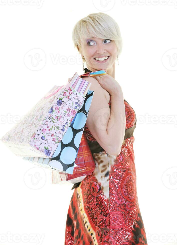 Happy young adult women shopping avec des sacs colorés photo