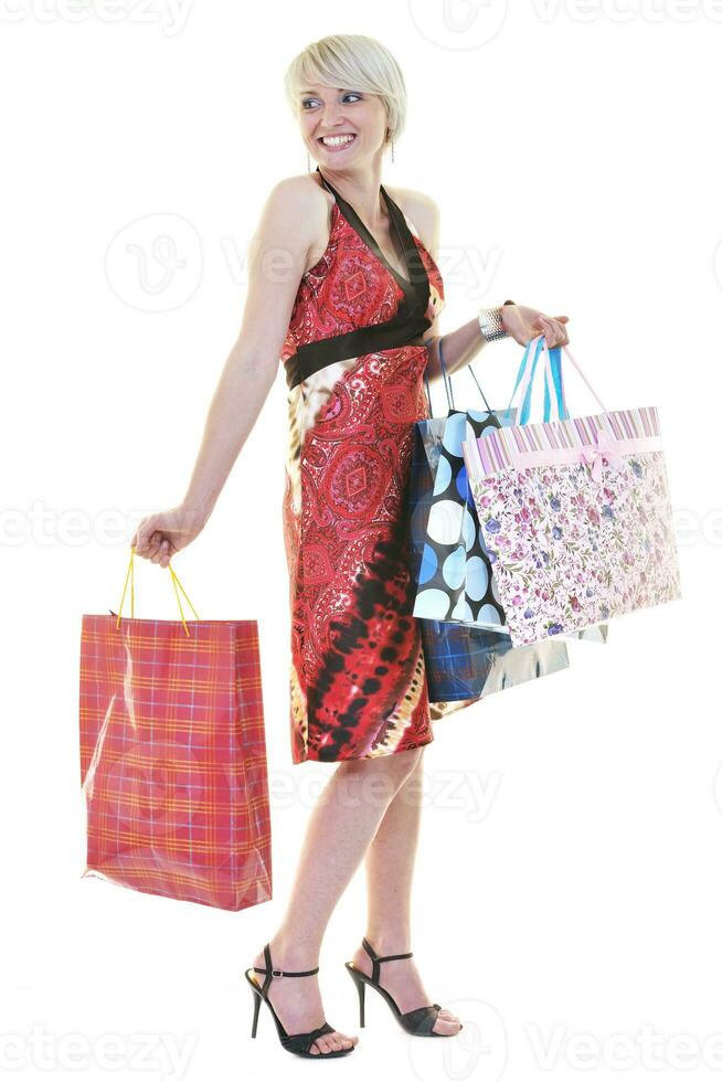 Happy young adult women shopping avec des sacs colorés photo