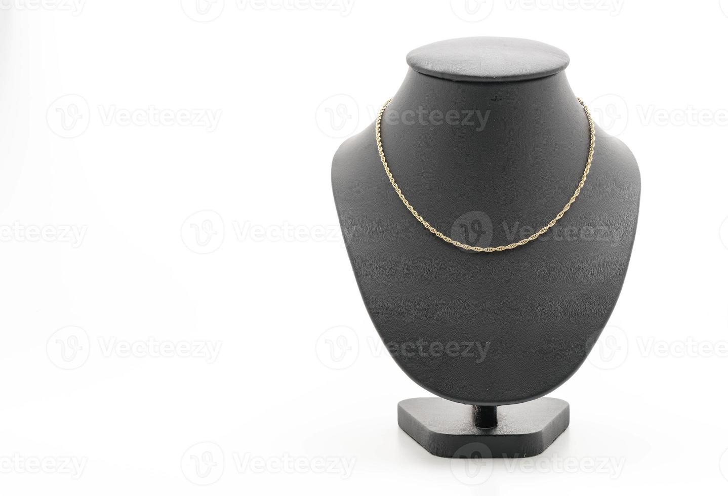 beau et collier de luxe avec collier de support de bijoux sur fond blanc photo