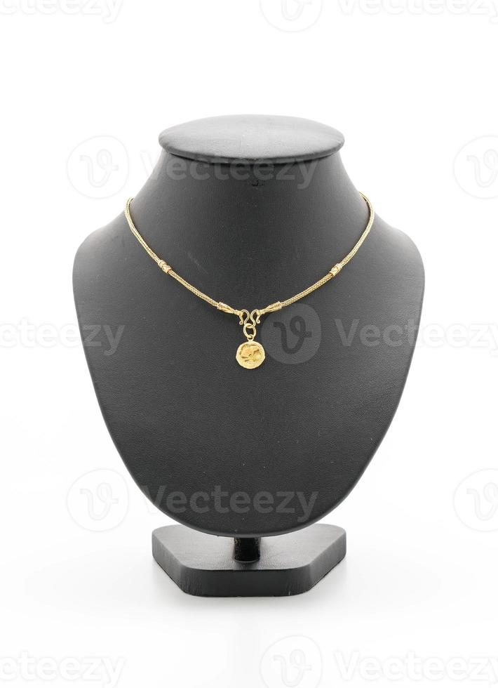 beau et collier de luxe avec collier de support de bijoux sur fond blanc photo