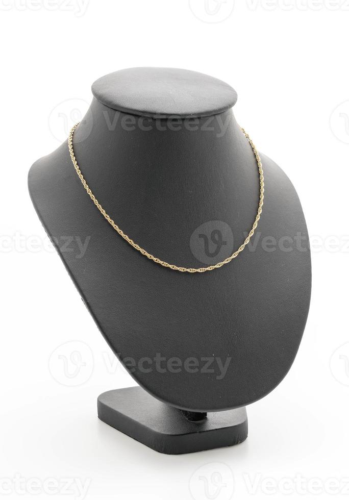 beau et collier de luxe avec collier de support de bijoux sur fond blanc photo